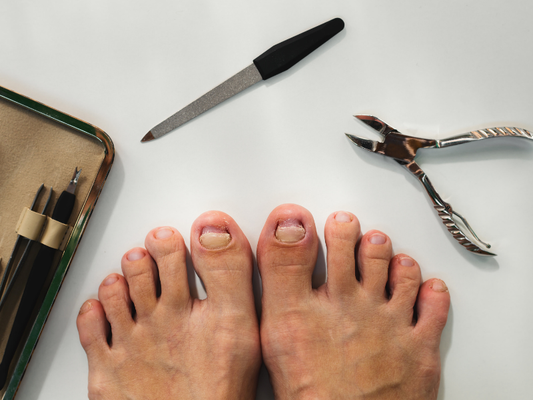 Why Do Some Men's Fingernails Press Against the Surrounding Skin?